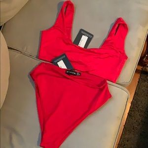 Red bikini with high waisted bottoms. US size 6.